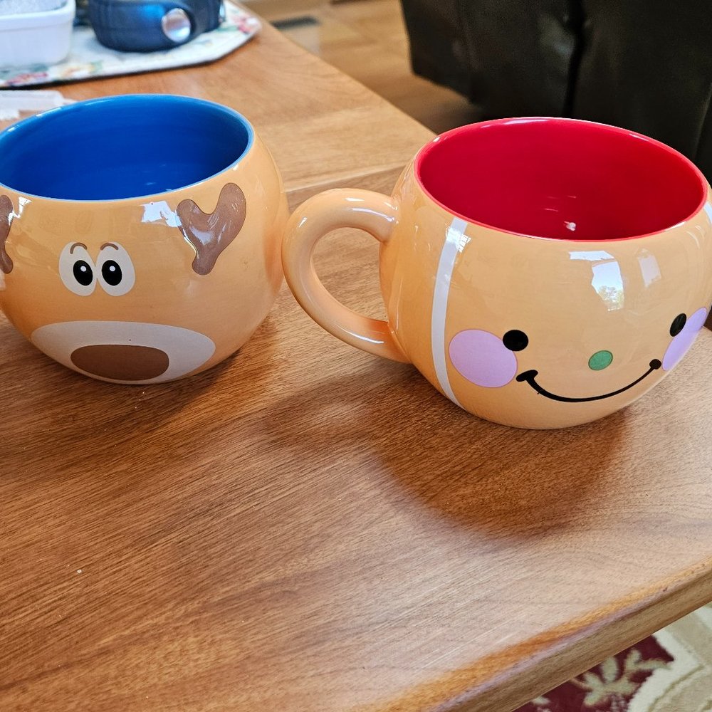 set of two temptations mugs holiday